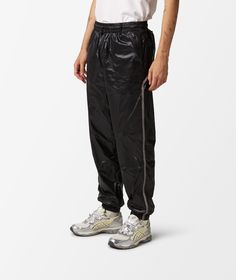 Puma, a brand with a rich history in sports and lifestyle apparel, continues to push boundaries with innovative designs that resonate with a global audience.Introducing the Track Pants x Skepta for Spring/Summer 2024. These sleek negro pants are part of the Pantalones de Chándal matching sets and designer collaborations category. Designed with style and comfort in mind, these track pants are perfect for any casual outing or workout session. Elevate your wardrobe with Puma's latest collaboration. Puma Track Pants, Athleisure Pants, Adidas Track Jacket, Adidas Track Pants, Workout Session, Adidas Track, Puma X, Spring Summer 2024, Black Trousers