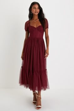 Sweep everyone off their feet with your romantic aesthetic in the Lulus Sweet Amor Burgundy Tulle Swiss Dot Tiered Bustier Midi Dress! Lightweight mesh fabric, with a sweet Swiss dot pattern throughout, shapes a sweetheart neckline (with hidden no-slip strips), sheer, short puff sleeves (with elastic at the cuffs), and a bustier-inspired bodice with supportive boning. High, fitted waist sits atop a flaring skirt (with a voluminous layer of tulle) that falls to a tiered midi hem. Hidden side zipp Bustier Midi Dress, Swiss Dot Dress, Prom Midi Dress, Wedding Guest Attire, Fall Wedding Guest, Fall Wedding Guest Dress, Prom Dress Stores, Guest Attire, Wedding Attire Guest