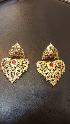 Kundan jhumka earrings in multi color with gold plated base Bollywood Style Earrings With Latkans For Designer Wear, Designer Chandbali Earrings With Latkans, Festive Designer Earrings With Latkans, Elegant Meenakari Earrings For Designer Wear, Festive Designer Latkan Earrings, Designer Kundan Earrings For Diwali, Multicolor Kundan Bridal Earrings With Intricate Design, Diwali Designer Jewelry With Latkans, Traditional Designer Earrings For Diwali