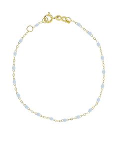 Gold/blue 14kt gold classic Gigi bracelet from GIGI CLOZEAU featuring spring-ring fastening, delicate chain and unique blue bead jewels. | Gigi Clozeau 14kt gold classic Gigi bracelet Beaded Jewels, Demi Fine Jewelry, Delicate Chain, Bracelet Gold, Blue Beads, 14kt Gold, Spring Rings, Womens Jewelry Bracelets, Gold Bracelet