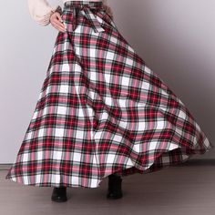 White plaid skirt: - Side seam pockets - Hidden zipper in the side seam - Separate sash - Classic tartan pattern - Fabric is 40% wool, 58% polyviscose, 2% of elastane Model is 6'2'', she wears US 8 size US 0  Bust 82 cm (32.5 inches) Waist 64 cm (25 inches) Hips 89 cm (35 inches) US 2  Bust 85 cm (33.5 inches) Waist 66 cm (26 inches) Hips 92 cm (36 inches) US 4  Bust 88 cm (34.5 inches) Waist 68 cm (27 inches) Hips 94 cm (37 inches)  US 6  Bust 90 cm (35.5 inches) Waist 71 cm (28 inches) Hips 96 cm (38 inches)  US 8  Bust 93 cm (36.5 inches) Waist 74 cm (29 inches) Hips 99 cm (39 inches) US 10  Bust 95 cm (37.5 inches) Waist 76 cm (30 inches) Hips 102 cm (40 inches) US 12  Bust 99 cm (39 inches) Waist 80 cm (31.5 inches) Hips 105 cm (41.5 inches) US 14  Bust 103 cm (40.5 inches) Waist 84 c White Flared Skirt For Winter, White Full Skirt For Fall, White Cotton Winter Skirt, Winter Cotton Plaid Skirt, Winter Plaid Cotton Skirt, Scottish Plaid Skirt For Winter, Winter Scottish Plaid Skirt, Christmas Outfit Women, White Plaid Skirt