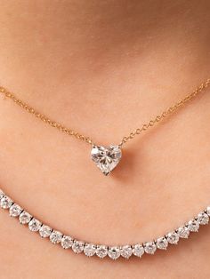 This beautiful diamond heart necklace is made to order. As always, we make a custom low profile basket for the heart diamond to sit in on a delicate 14K gold chain. It is perfect for wearing everyday on its own or layered with another necklace or two. 0.50ctw in stock is a G color SI2 clarity. Other sizes are custom made and can vary in color, clarity and cost. Available in 14K yellow, white or rose gold and the size of diamond vary based on your selection. This product is made to order and take Timeless Heart Cut Diamond Jewelry, Elegant Double Heart Jewelry With Prong Setting, Diamond Heart Cut Necklace With Prong Setting, Rose Gold Heart Cut Diamond Jewelry, Anniversary Heart Cut Solitaire Necklace With Prong Setting, Heart Cut Solitaire Necklace With Prong Setting For Anniversary, Heart Cut Solitaire Necklace With Prong Setting For Wedding, Classic Single Cut Diamond Necklace For Valentine's Day, Yellow Gold Heart Cut Diamond Necklace For Wedding