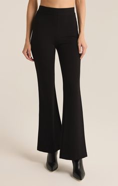 We love a good flare and this pant effortlessly transitions from the office to daily life. This chic high rise pant features a slim fit throughout the hips, a kick flare, and our fave detail; the supportive feel from the durable, stretchy fabric. Z SUPPLY Women's Do It All Flare Pant, Black, Large Flare Pant, Perfect Pant, Kick Flares, High Rise Pants, Trouser Pants, Flare Pants, Love A, The Office, Daily Life