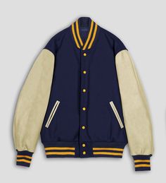 DETAILS OF JACKET The Classic Varsity Jacket Color: Navy Blue / Natural Cream Navy / Gold Rib on Neck, Wrist & Bottom/Hem Two External Side Pockets Exterior Sleeve: Cowhide Leather Interior: Polyester Quilted lining / Two Internal Pockets Style: Classic Varsity Care: DRY CLEAN ONLY We can add custom embroidery, printing, or labels on these jackets as per the customer's demand. Additional charges apply. Blue And Gold Letterman Jacket, Fall Varsity Jacket With Stand Collar, Fitted Varsity Outerwear For Fall, Fitted Outerwear With Button Closure For College, Navy Stand Collar Outerwear For Fall, Fall Varsity Outerwear With Button Closure, Varsity Outerwear With Button Closure For Fall, Fall Varsity Outerwear With Snap Buttons, Blue Varsity Jacket With Button Closure For College