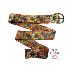 Belts are inspired by the flowers of the Peruvian Andes. Handmade embroidered by women from Ayacucho - Peru The strap is handwoven in wood looms and carefully hand-embroidered with colors that try to replicate the beauty of real flowers we see around us. We decided to be eco-friendly, so we use 100% sheep wool. Material: 100% sheep wool. Design: artistic floral. Width: 5 cm / 2''. It has 7 holes separated by 1'' / 2.5 cm from each other. The first hole is at 2'' / 5 cm from the end It will fit p Adjustable Belts For Spring Festival, Handmade Adjustable Belts For Gifts, Handmade Adjustable Belts As A Gift, Vintage Adjustable Belts For Spring, Spring Festival Fabric Belt, Bohemian Adjustable Belts For Summer, Bohemian Brown Belt For Festival, Adjustable Bohemian Summer Belts, Bohemian Embroidered Belt For Spring