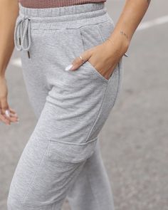 Grey Straight Leg Cargo Sweatpants We didn’t invent the grey sweatpant - we just made it better! Soft, stretchy, and irresistibly comfy, the new Signature Soft Straight Leg Cargo Sweatpants keep you perfectly cozy this season and beyond! These grey sweatpants feature your favorite not-too-thick Signature Soft fabric for that gotta-have-it soft feel you love with trendy cargo pocket styling! Why you’ll love it: Our famously cozy, stretchy, Signature Soft material in a straight leg mid-heathered g Gray Stretch Sweatpants For Leisure, Stretch Gray Sweatpants For Leisure, Gray Leisure Sweatpants With Side Pockets, Gray Stretch Pants For Leisure, Gray Stretch Sweatpants With Ribbed Waistband, Gray Stretch Sweatpants With Elastic Waistband, Sporty Gray Pants For Everyday, Gray Athleisure Sweatpants With Side Pockets, Gray Leisure Joggers