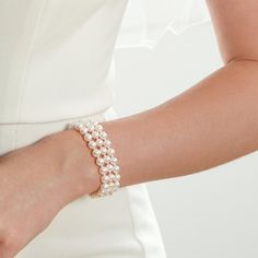 Triple Akoya Pearl Bracelet - Model Image Formal White Pearl Embellished Bracelets, Formal White Pearl Bracelets, Pearl White Pearl Beaded Jubilee Bracelets, Pearl White Pearl Beaded Jubilee Bracelet, Akoya Pearl Bracelets With Round Beads For Wedding, Luxury Pearl Bracelets For Wedding, Formal White Beaded Bracelets With Pearl Charm, Formal White Pearl Beaded Bracelets, Akoya Pearl Bracelet With Round Beads For Weddings