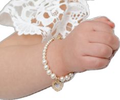 Heart-shaped Pearl Bracelet For Wedding, Elegant White Pearl Bracelet With Heart Charm, Elegant Pearl Jewelry For Baptism, Elegant Heart-shaped Pearl Bracelets, Wedding Pearl Heart Bracelet, Elegant White Pearl Heart Bracelet, Elegant Pearl Heart Bracelet With Charm, Elegant Pearl Heart Bracelet With Heart Beads, Elegant Pearl Bracelet With Heart Beads For Wedding