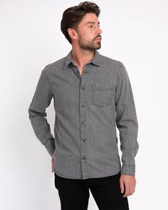 Amsterdam Heritage introduces the Flagler denim shirt for its menswear collection. Featuring a front pocket and snap button closure, the long-sleeved shirt is made from pure cotton, creating a lightweight and comfortable feel for the wearer. Adorned with our brand's logo, presented subtly in the back and side stitching, the Flagler is the ultimate classic denim shirt for every occasion. Never going out of style nor going out of season, style it with a blazer for a semi-casual look or match it wi Casual Washed Black Button-up Shirt, Washed Black Cotton Button-up Shirt, Washed Black Cotton Shirt With Button Closure, Washed Black Button-up Shirt With Pockets, Washed Black Long Sleeve Denim Shirt, Washed Black Cotton Shirt With Pockets, Casual Washed Black Long Sleeve Shirt, Spring Urban Button-up Shirt, Washed Black Long Sleeve Shirt With Button Closure