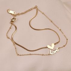 SPECIFICATIONSStyle: TRENDYShape\pattern: HeartOrigin: CN(Origin)Metals Type: CopperMetals Type: Stainless steelMaterial: MetalMaterial: Stainless SteelLength: 40cmItem Type: AnkletsGender: WomenFine or Fashion: FashionCN: GuangdongBrand Name: HOTPB Heart-shaped Metal Anklets For Gift, Heart-shaped Metal Anklets As Gift, Trendy Gold Heart-shaped Anklets, Metal Anklet With Adjustable Chain As Gift, Adjustable Metal Anklets As Gift, Trendy Valentine's Day Gift Anklets, Trendy Heart Shaped Anklets For Gift, Trendy Heart-shaped Anklets For Gifts, Foot Bracelet