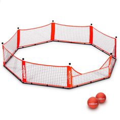 two tennis balls sitting on top of a net next to three red ball markers and an orange net