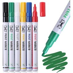 four markers, one green marker and five different colored markers with the same color in each pen