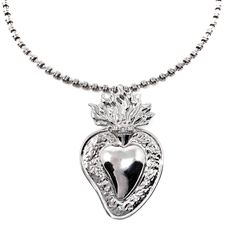 Based on a DelBrenna family design, our Flaming Heart pendant represents our passion for our craft. We love beauty, fashion, and sharing our creativity with you. This pendant calls you to open your heart and share your wonderful self with the world! Pendant in 925 silver with DelBrenna’s Signature Rhodium Finish. It is 2 1/4” in height and 1 1/2” wide. Its bail slides onto all DelBrenna chains up to 5mm. Chain sold separately. Flaming Heart, Italian Horn, Family Design, Open Your Heart, Family Heirloom, S Signature, Earring Backs, Jewelry Care, Heart Pendant