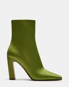 Indulge in luxury with the LIZABELLE bootie. Its sleek design and square toe add sophistication to any look. This ankle boot elevates your style and provides unmatched comfort. 3.5 inch heel height 10 inch shaft circumference 5.5 inch shaft height Textile upper material Leather lining Synthetic sock Synthetic sole Imported Green Boots Outfit, Square Toe Ankle Boots, Green Pencil Skirts, Green Boots, Skirts With Boots, Embellished Sandals, 5 Inch Heels, Green Shoes, Mood Board Fashion