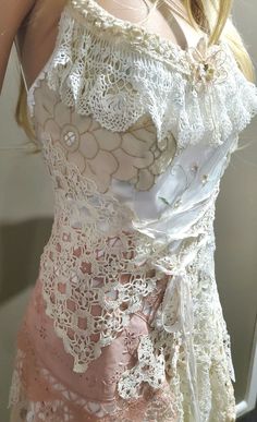 My latest creation is finally ready for a very unique bride, beach wedding or a very special occasion! With gorgeous hand dyed pink tones, it is made using all Vintage and Antique doilies and lace.  Many variations of gorgeous lace and doilies have been meticulously hand-sewn and layered to create a beautifully textured silhouette.   Several pieces of lace featuring in the skirt section have been rescued from a wedding dress which was made in the 1880's!  I have also added a unique feature with Wedding Dress Bohemian Style, Alternative Wedding Dress, Dress Alternative, Wedding Dress Bohemian, Bohemian Style Dresses, Alternative Wedding Dresses, Designer Gown, Unique Bride, Boho Style Outfits