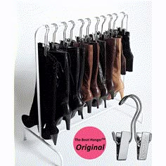 the boot hanger is holding several pairs of women's boots and has an adjustable hook for each pair