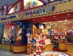 the front entrance of a toy store with an image of a cartoon character on it