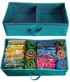 an open suitcase filled with lots of different types of fabrics