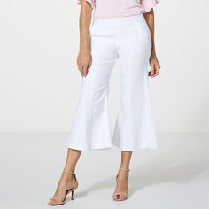 C Wonder by Christian Siriano Flared Wide Leg Pant  Unique, yet a wardrobe chameleon, this cropped wide-leg pant from Christian Siriano can be casual or dressy, depending on your fashion appetite. If you're in search of a desk-to-dinner favorite — look no further. Spring Flare Pants In Solid Color, Solid Color Flare Pants For Spring, Chic Stretch Cropped Leg Dress Pants, Flare Bottoms In Solid Color For Summer, Flared Solid Bottoms For Summer, Chic Cropped Leg Dress Pants For Fall, Chic Cropped Dress Pants For Fall, Summer Solid Color Flare Bottoms, Solid Flare Bottoms For Summer