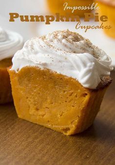 pumpkin pie cupcakes with whipped cream on top