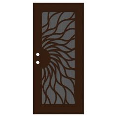 a brown door with an intricate design on it