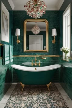 a bathroom with green tile and gold fixtures, including a claw foot tub in the center