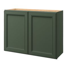 a green cabinet with two doors and a wooden top