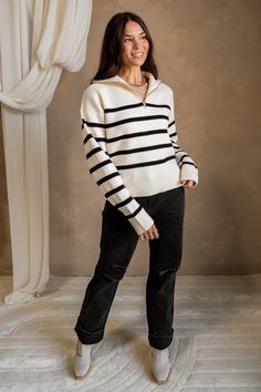 Elevate your casual style with the Luna Cream & Black Quarter Zip-Up Sweater. Featuring a chic stripe pattern in soft cream and black knit fabric, this sweater is perfect for layering or wearing on its own. The quarter zip-up design allows for versatile styling, while the high neckline provides extra warmth and comfort. Finished with ribbed hems and long sleeves, this cozy piece effortlessly combines modern flair with classic elements, making it a must-have for your wardrobe. Striped Sweater Outfit, Black Quarter Zip, Fall Winter Wardrobe, Quarter Zip Sweater, Half Zip Sweaters, Collar Sweater, Zip Up Sweater, Fashion Fits, Quarter Zip Pullover