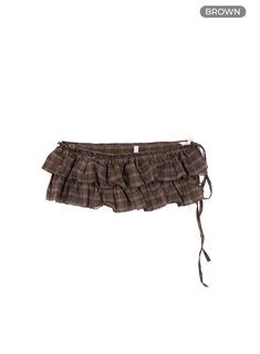 brown Layering Mini Skirt, Tie On Skirt, Campfloggnaw Outfits, Layered Fashion Street Style, Layered Style Clothes, 2000s Mini Skirt Outfit, Winter Mini Skirt, Skirt Over Jeans, Bubble Skirts