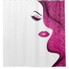 a pink and white shower curtain with a woman's face