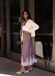 Crafted with a luxurious silk-like texture, the Forever Passionate Midi Skirt exudes an air of elegance. Its delicate white lace detail provides a touch of femininity, making it a versatile piece for any occasion. With a side zipper for effortless and secure dressing, this skirt is a timeless addition to your wardrobe. Fabric 100% Polyester Chic Lace Maxi Skirt With Lace Trim, Chic Spring Maxi Skirt With Lace Trim, Spring Lace Trim Midi Skirt, Chic Lace Bottoms For Daywear, Flowy Lace Maxi Skirt In Chic Style, Spring Lace Maxi Skirt, Chic Lace Top Skirt For Spring, Chic Flowy Lace Maxi Skirt, Spring Maxi Skirt With Lace Trim And Relaxed Fit