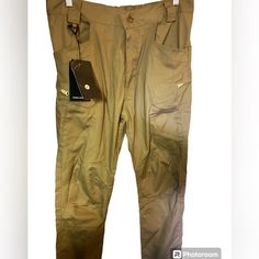 Nwt Tactical Utility Pants Tan Outdoor Medium Outdoor Equipment Multiple Pockets Flat Lay Measurements Waist 16” Length 40” Inseam 28” Ankle 7” Smoke Free Pet Friendly Home Thanks For Shopping With Me And If You Have Any Questions Please Let Me Know 9 Khaki Military Cargo Pants For Outdoor, Khaki Techwear Cargo Pants For Hiking, Techwear Khaki Cargo Pants For Hiking, Combat Style Khaki Cargo Pants For Hiking, Techwear Cargo Pants For Outdoor Work In Khaki, Khaki Techwear Cargo Pants For Outdoor Work, Practical Khaki Cargo Pants With Pockets, Techwear Style Khaki Cargo Pants For Outdoor Work, Combat Style Khaki Work Pants For Outdoor