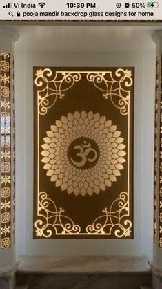 an intricately decorated room with gold and white decorations on the wall, along with marble flooring