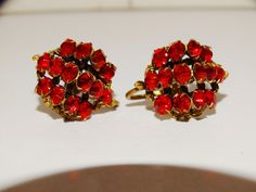 "Circa 1920's Gold Tone Czechoslov designer Red Earrings. 0.95\" x 0.70\" size." Vintage Red Clip-on Earrings, Vintage Red Earrings For Party, Vintage Red Clip-on Earrings For Evening, Red Vintage Clip-on Earrings, Retro Red Clip-on Earrings For Formal Occasions, Red Clip-on Earrings For Anniversary, Vintage Red Clip-on Earrings For Anniversary, Retro Red Earrings For Formal Occasion, Red Vintage Clip-on Earrings For Anniversary