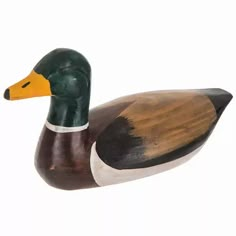 a wooden duck on a white background