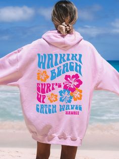 Get ready to hit the beach with this cute Coconut Girl Hoodie featuring Waikiki Beach Hawaii! This unique Hibiscus Flower Surf Hoodie is super comfy! Size up for a Trendy Oversized Look! SHIPS FREE! SIZING TIPS: Size up 2-3 sizes from your "usual size" to get the "Oversized" Look! (2 sizes up is most common, and 3 sizes up is more dramatic) For a "relaxed fit" order your "usual size". When in doubt, lay your favorite fitting Sweatshirt flat and measure armpit to armpit and compare the width agai Casual Pink Sweatshirt For Vacation, Casual Pink Beach Sweatshirt, Pink Letter Print Sweatshirt For Vacation, Pink Summer Vacation Sweatshirt, Cotton Hoodie For Beach Vacation, Pink Sweatshirt For Summer Vacation, Casual Graphic Print Hoodie For Vacation, Summer Vacation Hoodie With Graphic Print, Pink Cotton Sweatshirt For The Beach