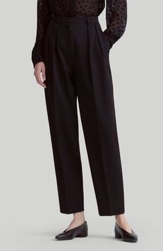 Tailored from Italian-woven virgin wool, these tapered-leg pants feature reversed front pleats that create a relaxed fit. 27" inseam; 15" leg opening; 12 1/2" front rise; 16" back rise (size 42FR) Zip fly with hook-and-bar closure Front slant pockets; back button-welt pockets 100% virgin wool Dry clean Made in Italy Designer Clothing Wool Wide Leg Pants For Work, Elegant Formal Pants With Relaxed Fit, Elegant Wool Wide Leg Ankle-length Pants, Elegant Semi-formal Pants With Relaxed Fit, Elegant Semi-formal Relaxed Fit Pants, Evening Dress Pants With Welt Pockets And Tapered Leg, Evening Dress Pants With Tapered Leg And Welt Pockets, Elegant Relaxed Fit Dress Pants With Pressed Crease, Elegant Relaxed Fit Dress Pants For Work