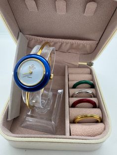 Enter the promo code INVENTORY to get a 20% discount on your purchase. **Authentic Gucci 5 Bezel Watch** **Pre-loved, good condition** - Made in Italy - Currently meets timekeeping standards - Evaluated by a Watch Specialist - Fits up to a 5.75-inch wrist - Crystal glass has very tiny hairline scratches, but they are unnoticeable when wearing - Comes with metallic gold, silver, green, red, and blue bezels, and a jewelry box as seen in the photos Please check all photos for the actual size and co Luxury Timeless Collectible Watch Bands, Luxury Things, Bezel Watch, Bangle Watches, Gucci Watch, Insurance Coverage, Women Wrist Watch, Watch Movement, Christmas Wishlist