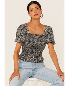 Beyond The Radar Women's Ditsy Floral Print Smocked Shirt, Black Casual Fall Tops With Smocked Cuffs, Trendy Short Sleeve Top With Smocked Back, Trendy Smocked Back Top For Spring, Short Sleeve Tops With Smocked Back For Fall, Trendy Spring Tops With Smocked Back, Fitted Smock Tops For Fall, Casual Smock Top For Day Out, Fitted Ditsy Floral Print Top For Fall, Fitted Top With Ditsy Floral Print For Fall