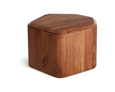 a small wooden box sitting on top of a white surface