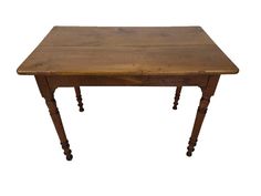 an old wooden table with turned legs and no one sitting at the top, on a white background