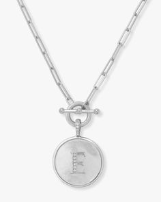 The Love Letters Medallion Necklace is like a little love note you can wear. Choose between luxe 18k gold or sleek silver plating for a piece that shines as bright as you do. The medallion features a stunning mix of Mother of Pearl and pavé stones-proof that it's the little details that steal hearts. Whether you're dressing up or keeping it casual, this is your new go-to necklace for every day. Because who doesn't want a love letter they can wear every day? DETAILS: Pendant Necklace Length: 20" Melinda Maria Jewelry, Letter Necklace Silver, Pearl Necklace Earrings, Love Note, A Love Letter, Medallion Necklace, Letter Necklace, Love Letter, Gold Pendant Necklace