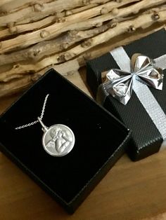 "❤ Genuine Sterling Silver small Cherub Angel Memorial Necklace Or Bracelet❤ .925 Sterling Silver 1/2 inch Cherub Angel charm Sterling Silver Chain (you select style & length) or Adjustable Bangle Bracelet Adjustable bangle- 63mm- fits 7 to 8.5 inch wrists. Stamped \"925\" for authenticity. Comes beautifully packaged - ready to give as a gift or keep for yourself! SHOP Forever Memory Designs: http://www.etsy.com/shop/ForeverMemoryDesigns" Sterling Silver Jewelry Gift For Her With Box, Silver Necklaces With Gift Box For Valentine's Day, Silver Necklace For Valentine's Day With Gift Box, Sterling Silver Jewelry In Gift Box For Her, Silver Jewelry Gift For Her With Gift Box, Silver Necklace With Gift Box For Gift, Sterling Silver Necklace With Gift Box, Silver Jewelry Gift Wrapped For Gift, Sterling Silver Necklace In Gift Box