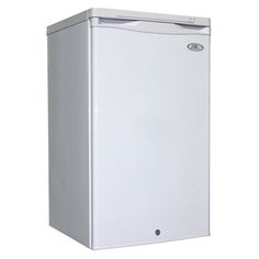 a white refrigerator freezer sitting on top of a white floor next to a wall