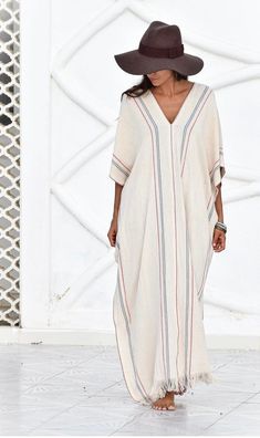 These super soft cotton tunic dresses are handmade in Sayulita, Mexico. This knee length dress is reversible can be worn with ties or without. Comes in two colors: natural white and red & blue stripe. Handmade by Quiut, Sayulita MX. One size Width - 20 ", length - 57", V-neck depth - 12" 100% natural cotton Photos with models courtesy of Quiut. Beach Kaftan Dress, Beach Tunic Dress, Maxi Beach Dress, Oversize Dress, Cotton Tunic Dress, Tunic Dresses, Cocoon Dress, Cotton Tunic, Beach Maxi Dress