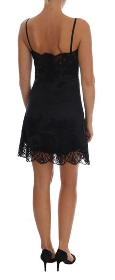 DOLCE & GABBANA Gorgeous brand new with tags, 100% Authentic Dolce & Gabbana silk black floral lace lingerie chemise dress. Model: Lingerie chemise dress Color: Black with floral lace Logo details Made in Italy Material: 68% Silk 16% Nylon 6% Viscose 6% Cotton 4% Elastane Luxury Silk Dress With Lace Trim, Luxury Cotton Dress With Lace Trim, Luxury Lace Dress With Lace Trim, Luxury Black Lace Dress With Delicate Details, Luxury Silk Floral Dress, Luxury Cotton Dresses With Lace Trim, Luxury Black Lace Dress With Lace Trim, Luxury Black Delicate Lace Dress, Luxury Black Lace With Lace Trim