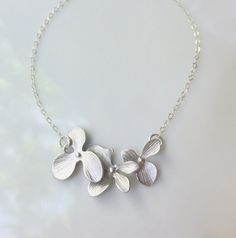 Gold or Silver Orchid Necklace  Flower Necklace by GlassPalaceArts, $34.00 Delicate Silver Jewelry With Flower Decoration, Silver Flower Necklace For Wedding, Flower Charm Necklace For Bridesmaid Gift, Silver Delicate Flower Charm Necklace, Delicate Silver Flower Charm Necklace, Silver Flower Necklace With Delicate Chain For Wedding, Elegant Silver Flower Necklace With Decoration, Dainty Silver Flower Necklace With Delicate Chain, Elegant Silver Flower Decoration Necklace