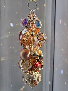 a bunch of beads hanging from a hook