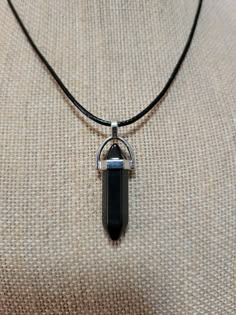 "Black Obsidian crystal pendant on a 20\" black cord adjustable necklace" Black Crystal Pendant, Obsidian Crystal Necklace, Black Gem Necklace, Black Casual Necklace With Adjustable Cord, Casual Black Necklace With Adjustable Cord, Casual Black Pendant Jewelry, Black Crystal Necklace With Adjustable Cord, Adjustable Black Onyx Crystal Necklace, Casual Black Jewelry With Adjustable Cord