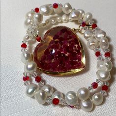 Red/Pink Resin Heart Pendant Necklace. Fresh Water Pearls & Red Crystal Beads - Finished With Gold Colored Lobster Clasp. 20” Long Nwot Valentine's Day Gift Pink Beaded Necklaces, Heart Beaded Necklaces For Valentine's Day Gift, Valentine's Day Necklace With Heart Charm And Round Beads, Valentine's Day Heart Charm Necklace With Round Beads, Valentine's Day Gift Heart Beaded Necklaces, Valentine's Day Gift Beaded Necklace With Heart Beads, Pink Heart Pendant Beaded Necklace For Valentine's Day, Red Pearl Necklaces For Valentine's Day, Heart-shaped Beaded Necklace For Parties